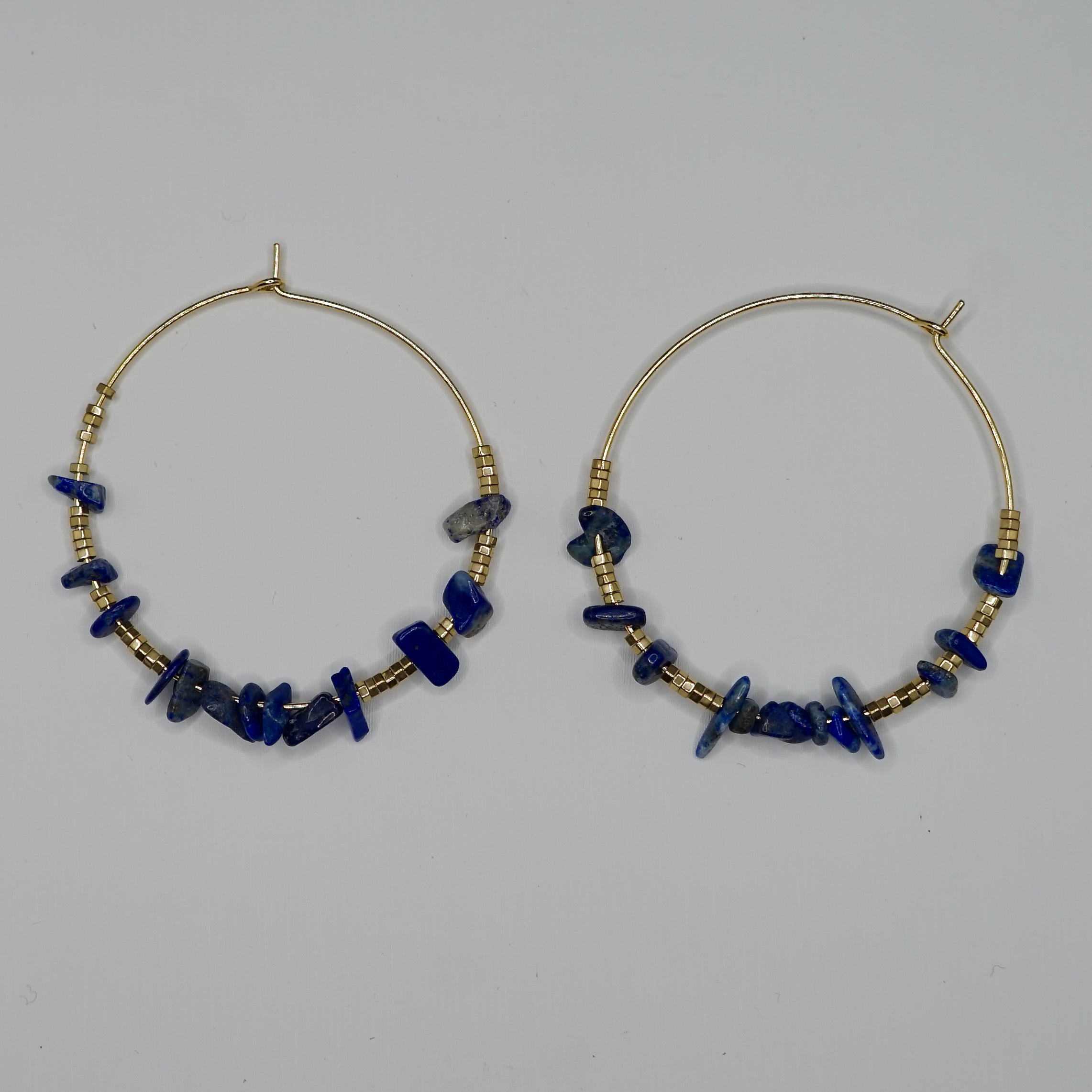 Boucle d'oreille LXX